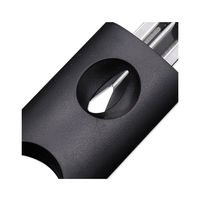 Close-up of a black cigar cutter with a metallic blade on a white background. Vape Dokha